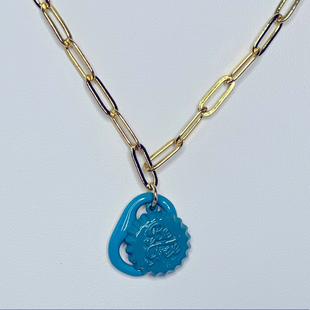 Gold tone paper chain link with charms